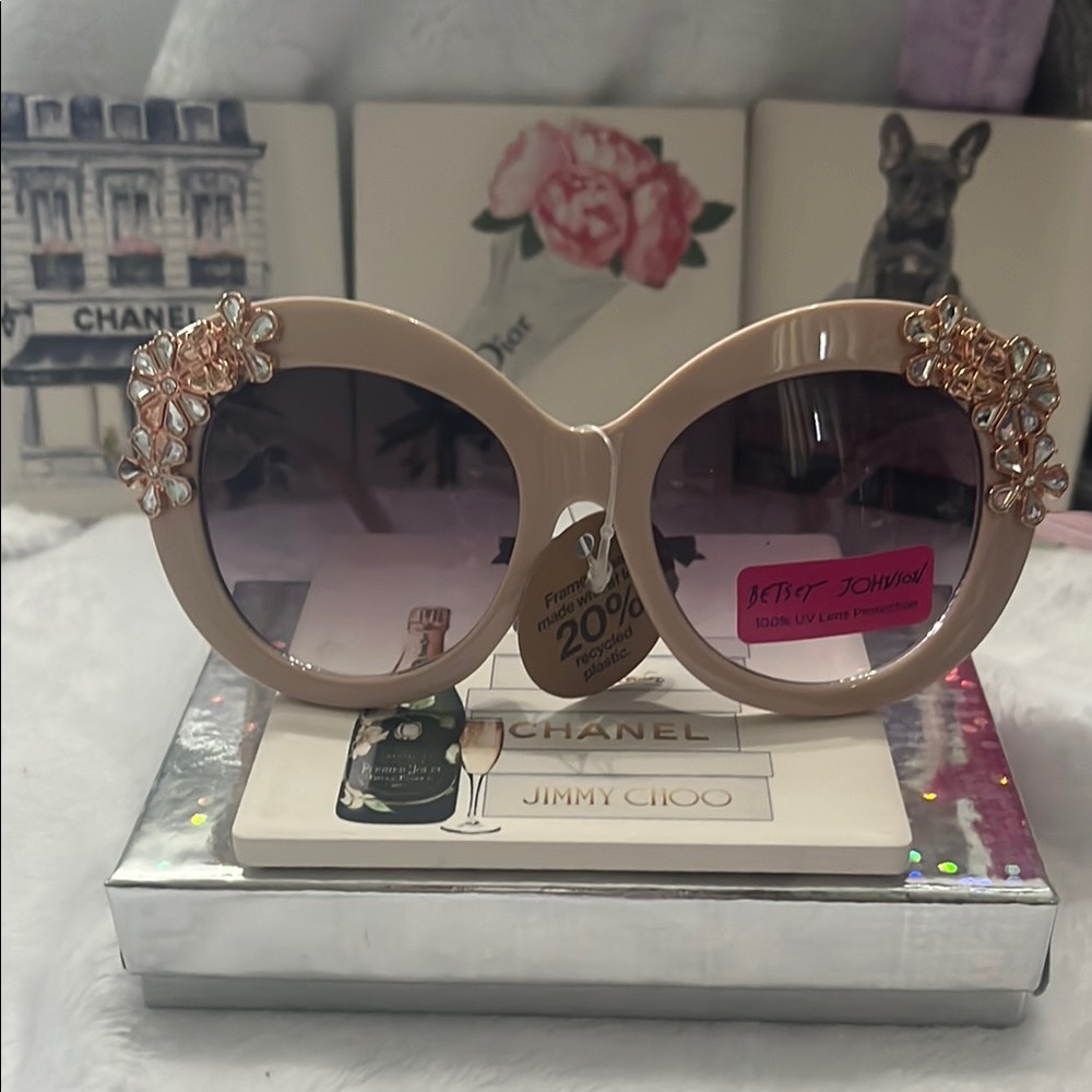 Betsey Johnson Embellished Sunglasses comes with unbranded dust bag.